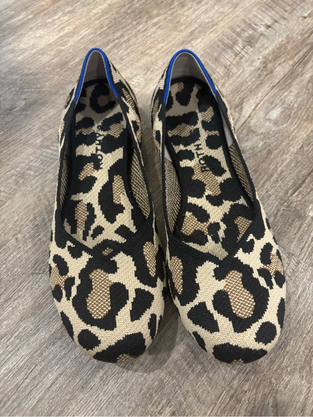 Rothy’s flat in camo cat size 10